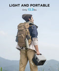 Man with backpack holding River 2 Max Portable Power Station With 512Wh LiFePO4 Battery, 1000W Peak Output, for camping.