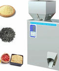 Automatic Powder And Granule Filling Machine With Hassle Free Setup, Rock Solid Stainless Steel Frame, Digital Scale For Precision Weighing, 10 To 500 Gram Range, Plug And Play Packaging For Tea Grains Feed Jewelry with various ingredients.