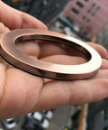 Close-up of bronze-plated number 0 from 20-Pack 2.76 Inch High 3D Address Numbers 0-9 Bronze Plated Self-Adhesive Door Numbers
