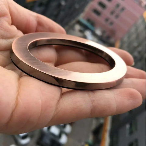Close-up of bronze-plated number 0 from 20-Pack 2.76 Inch High 3D Address Numbers 0-9 Bronze Plated Self-Adhesive Door Numbers
