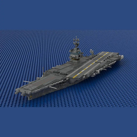 Top Shelf USS Enterprise CVN 65 Aircraft Carrier Building Blocks Set With 4941 Heavy Duty Bricks And 1 350 Scale Military Ship Model angle view on blue background.