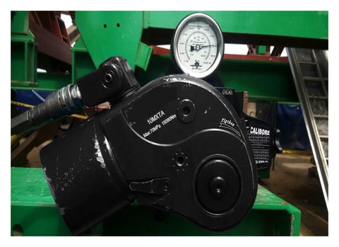 Rock Solid Heavy Duty Hydraulic Torque Wrench Built From Premium Alloy Steel Delivering Knockout 4332 Nm Output Via 1 Inch Square Drive With Plus Minus 3 Percent Precision And Freely Swiveling Hose For Quick Job Site Tasks, showing gauge and attachments.