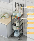 Five Tier Heavy Duty Storage Rack With Smooth Swivel Rolling Wheels Industrial Platform Shelving Unit For Garage Home Organization Rock Solid Rust Coated Steel Frame with kitchen items, bowls, and hook area.