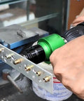 Upgrade Your Tool Kit With This Cool Nutsert Adapter And Electric Rivet Gun Setup Perfect For Auto Repairs Or Home DIY Projects. green metal nutsert adapter on drill, installing rivet nuts in steel panel