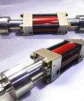 Waterjet pump intensifier assembly with red cylindrical body, silver end caps, and mounting brackets.
