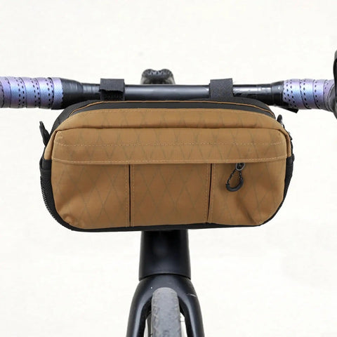 Waterproof Nylon Bike Handlebar Bag With Grab And Go Large Main Compartment And Side Pockets For Mountain Road And E Bike Commuter Gear Front Storage Pouch For Tools Snacks Phone And More In Brown on bicycle handlebars