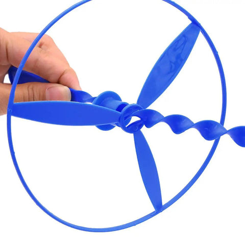 Close-up of blue plastic dragonfly disc launcher, part of 40 sets outdoor flying discs with launchers for kids, dragonfly disc flyers.