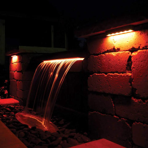 LED Color Changing Hardscape Light 6-Inch Multicolored With Oil Rubbed Bronze Finish illuminating outdoor waterfall