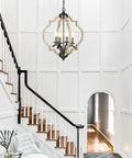 Farmhouse Orb Chandelier With 4 Lights, Handmade Distressed Wood And Rusty Metal Fixture in a modern foyer setting