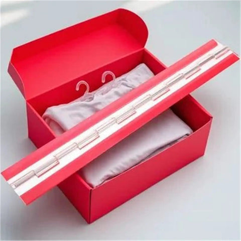 Mini Self Adhesive Folding Piano Hinge For Boxes And Cabinets Clear Transparent Hinge on a red cardboard box