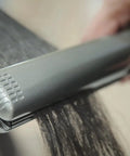 Extreme Nano Titanium Hair Straightener With Floating Plates, Fast Heating, Frizzy Hair Fix shown straightening hair