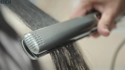 Extreme Nano Titanium Hair Straightener With Floating Plates, Fast Heating, Frizzy Hair Fix shown straightening hair