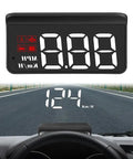 Slick Plug And Play Hud Obd Display With Built In Lens Hood For Zero Windshield Glare showing speed on dashboard monitor.