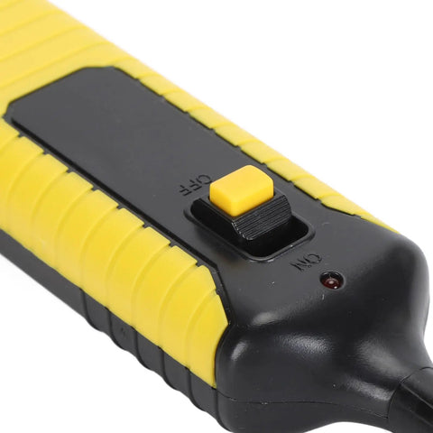 Close-up of a black and yellow switch with on and off labeled on a handheld tool