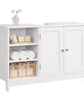 Top Notch White Pedestal Sink Cabinet With Double Doors And Adjustable Shelving features a U Shape cutout with towels and decor.