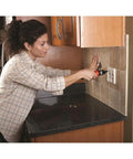 Person using Cordless Screwdriver With Forward And Reverse Switch, Manual Screw Driving Option for socket installation