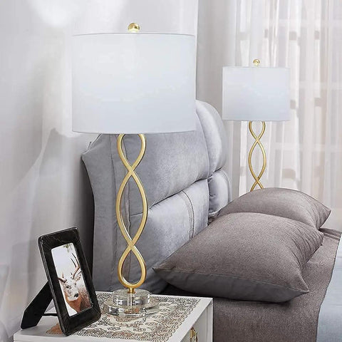 Dope Gold 30 Inch Table Lamps Set of 2 with Crystal Base and White Fabric Shade beside bed in bedroom setup.