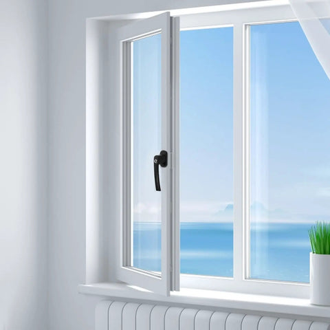 Open window with ocean view through pane, partially visible black handle and white frame