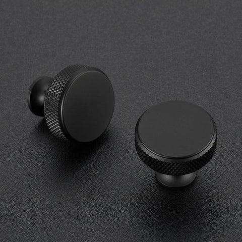 Round Matte Black Knobs And Knurled Single Hole Pulls, solid metal cabinet hardware, front view, durable finish by Ravinte