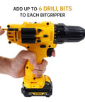 Person inserting drill bit into CNCSS Drill Bit Holder Holster Pack Of 4 Attaches To The Side Of Your Drill Carrying Up To 6 Driver Bits
