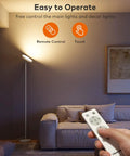 71 Inch Tall LED Floor Lamp With Remote And Touch Control in living room, showing remote close-up and ambient lighting.