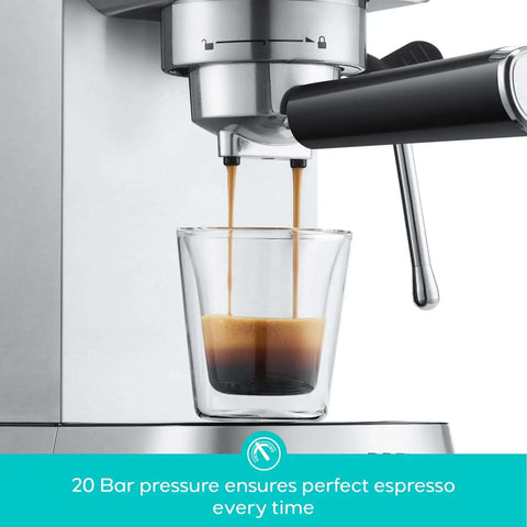 Close-up of Compact 20 Bar Espresso Machine With Steam Milk Frother, showing espresso being brewed into a glass.