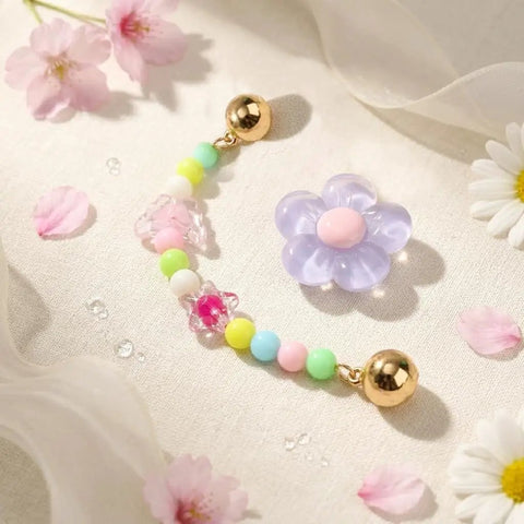 Pastel Jelly Daisy Flower Shoe Charms Set With Glossy Bling Floral Buckles, colorful resin flower charms on a light fabric background.