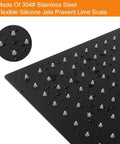 Close-up of matte black 12 Inch Rain Shower Head With 15 Inch Extension Arm Matte Black Stainless Steel Large Square Rainfall For Full Body Coverage Easy 5 Minute Install Spa Like Waterfall Experience At Home showing silicone jets and water droplets.