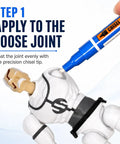 Action Figure Joint Reinforcement Glue Pen applying to a loose joint on a model for stability. Precision chisel tip in use.
