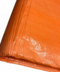 Heavy Duty Insulated Concrete Curing Blanket Cover 6x24 Foot With Foam Core And 8x8 Poly Outer Weave PE Coated Tarp, orange fold view.