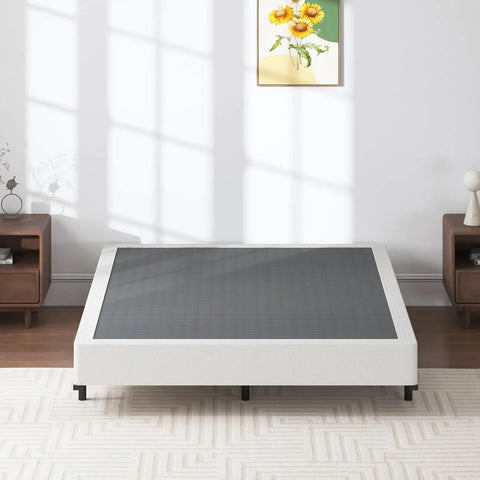 Heavy Duty Queen Box Spring 7 Inch Metal Frame Mattress Foundation Bed Base Built Tough For Rock Solid Support And Zero Flex Design 3000 Pound Weight Limit in a bright bedroom setting.