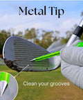 Close-up of golfer cleaning club groove with Forever Tee Premium Metal Unbreakable Golf Tees 2 Pack With Extended Metal Tip on course.