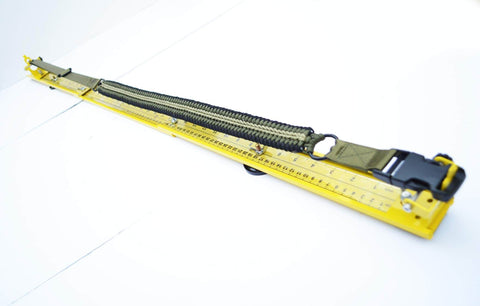 Adjustable Paracord Jig 2 To 47 Inches displayed in yellow aluminum, used for bracelets and belts with clasp and hook support.
