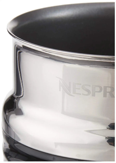 Top Tier Compact Espresso Machine Bundle With Included Milk Frother For Snappy Morning Brews close-up of sleek metallic interior.