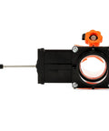Rhino Blaster Pro Holding Tank Rinser with gate valve, side view showing high-pressure jet setup for RV sewer cleanup
