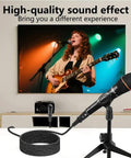 XLR 3 Pin Splitter Cable 1 To 2 Mic Adapter connected to microphone, with coiled cable, in front of musician on stage