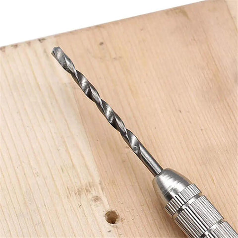 Close-up of a drill from Mini HSS Drill Bits Set 0.5mm to 2.0mm Straight Shank, on a wooden surface for PCB drilling