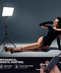 Model posed with 2-Pack 25W LED Video Lighting Kit with dimmable studio lights and remote control demonstration