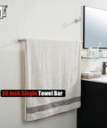 Wall mounted Heavy-Duty 33 Inch Stainless Steel Towel Bar for Bathrooms With 304 Brushed Finish holding towel above sink