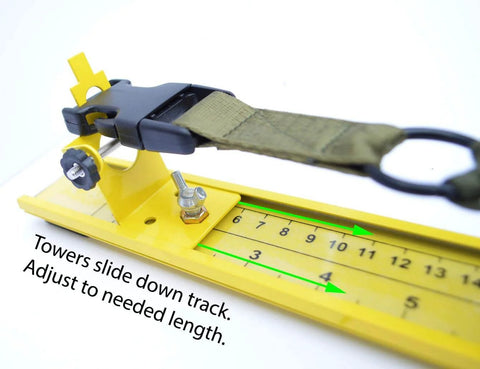 31 Inch Adjustable Paracord Jig, Lightweight Aluminum holding a strap, measurement markings visible on tool surface