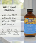 Alcohol Free Witch Hazel Distillate Face Toner With Fragrance Free Natural Astringent For Clear, Brightening Skin in 8oz amber bottle on table