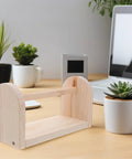 Solid Wood Tape Dispenser With Razor Sharp Blade Keep Your Craft And Packing Tape Setup Sick And Tidy Clean Desk Organization For Home Office Or Kitchen Counter Vibes on a desk with plants.