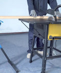 Beefy Heavy Duty Roller Stand With 300 Lb Capacity, 3 In 1 Roller, Adjustable Miter Saw Extension next to saw cutting wood