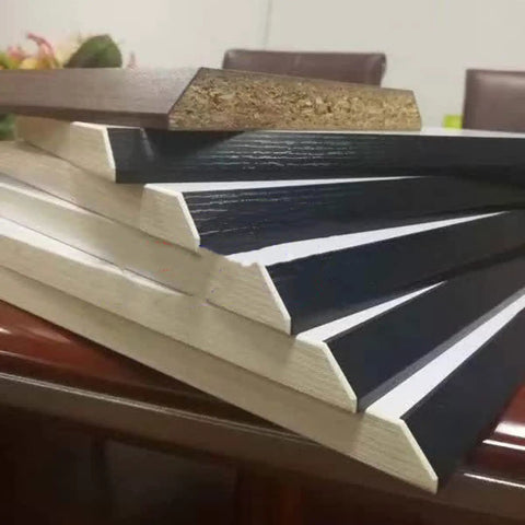 Stack of wood panels with edges sealed by Portable 45 Degree Tilting Edge Banding Machine For Wood And PVC, DIY Friendly Manual Edge Bander