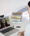 Person smiling at their laptop using Get Ready To Look Dope With This Top Tier Full HD 1080p HD Pro Web Cam.