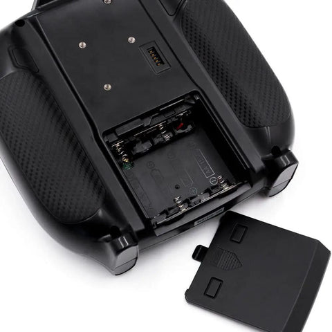 Back view of Ultra Reliable 2.4 GHz RC Transmitter With 8 To 10 Channels, battery compartment open, fits FS SR8 Receiver.