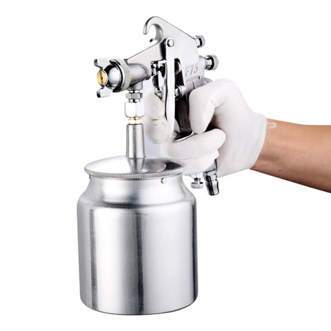 Heavy Duty Adjustable Pneumatic Paint Sprayer Built Like A Beast with metal cup and ergonomic grip for precision use.