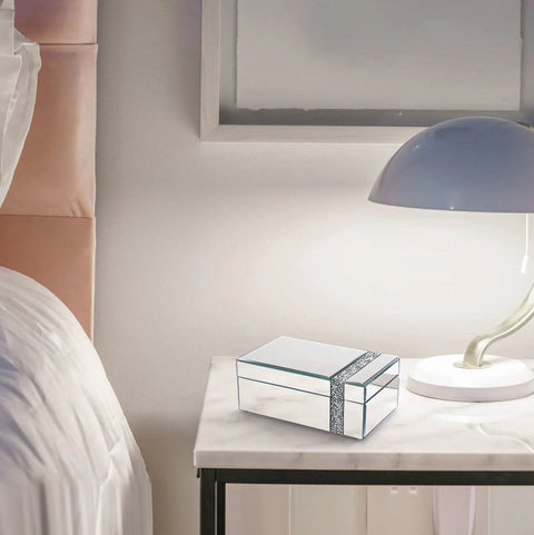 Lux Glass Mirrored Jewelry Box With Crushed Diamonds Strip Decor And Blinged Out Sparkle Accent on nightstand beside lamp