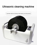 Straight Up Ultrasonic Vinyl Record Cleaner With Secure Wash Basin And Gentle Rotation Action Sweeps Away Dust Hella Clean setup with black vinyl records.