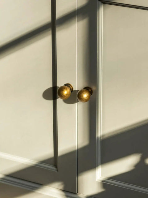 Antique Brass Cabinet Knobs Set For Vintage Look Cabinets And Drawers Zinc Alloy Hardware Handles on beige door